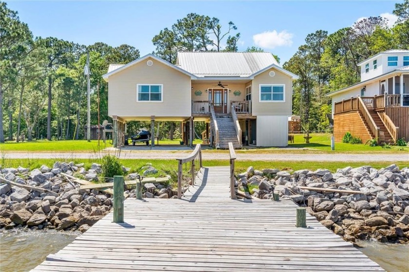 This stunning waterfront property offers the perfect combination - Beach Home for sale in Coden, Alabama on Beachhouse.com