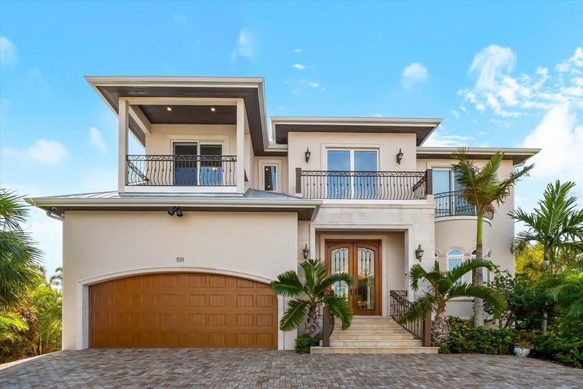 Experience the ultimate island paradise in this practically NEW - Beach Home for sale in Holmes Beach, Florida on Beachhouse.com