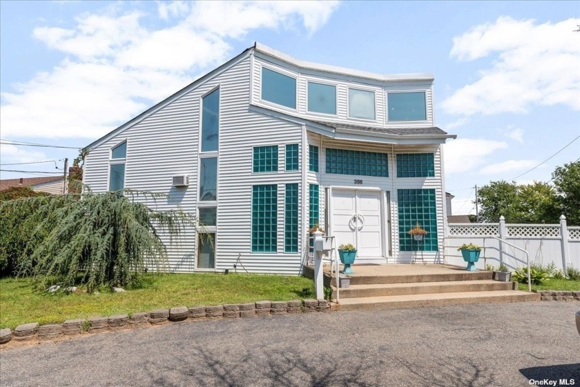 Welcome to this stunning contemporary home, perfectly situated - Beach Home for sale in Lindenhurst, New York on Beachhouse.com