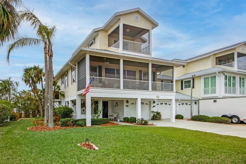 This charming 3 bedroom, 2 bathroom home offers a perfect blend - Beach Home for sale in Holmes Beach, Florida on Beachhouse.com
