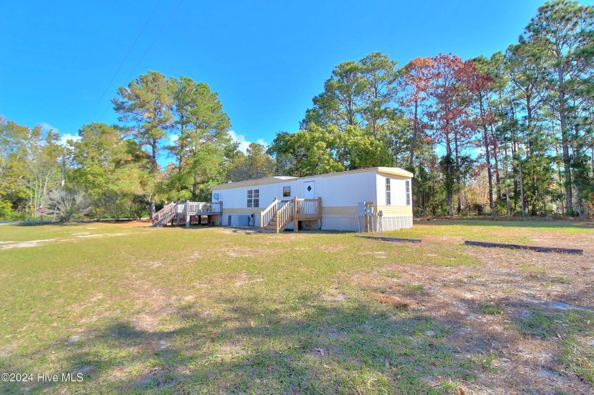 This 2 bedroom, one bath home is a hidden gem just waiting for - Beach Home for sale in Shallotte, North Carolina on Beachhouse.com