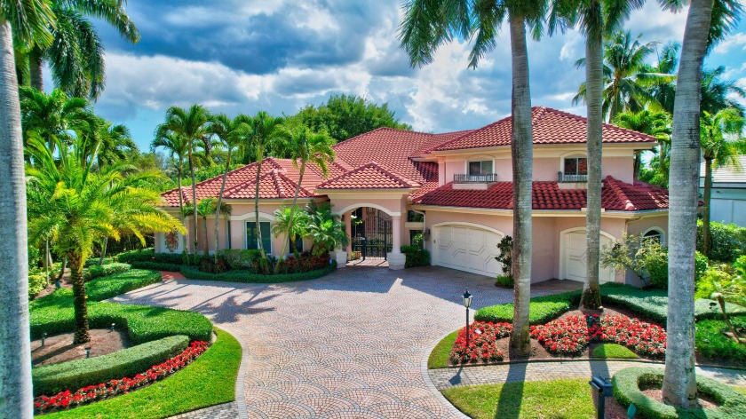 This two-story, 6-bedroom + office home is located on an - Beach Home for sale in Boca Raton, Florida on Beachhouse.com