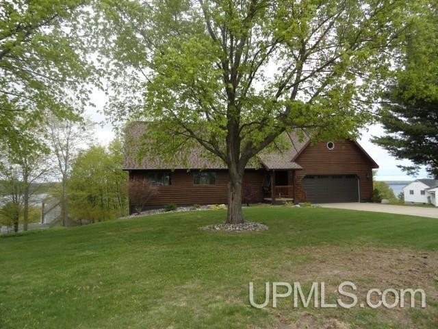 Step into this stunning custom built home and you may never want - Beach Home for sale in Munising, Michigan on Beachhouse.com