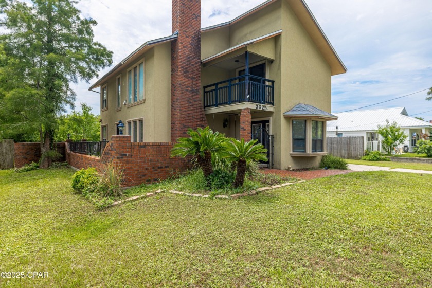 Nestled on a spacious 0.25-acre lot on the desirable east end of - Beach Home for sale in Panama City, Florida on Beachhouse.com
