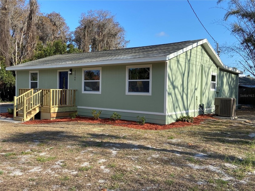Stunning Fully Renovated 3-Bed, 2-Bath Home in Moon Lake Estates - Beach Home for sale in New Port Richey, Florida on Beachhouse.com