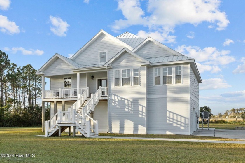 Welcome to 205 Gem Court, a stunning waterfront retreat nestled - Beach Home for sale in Beaufort, North Carolina on Beachhouse.com