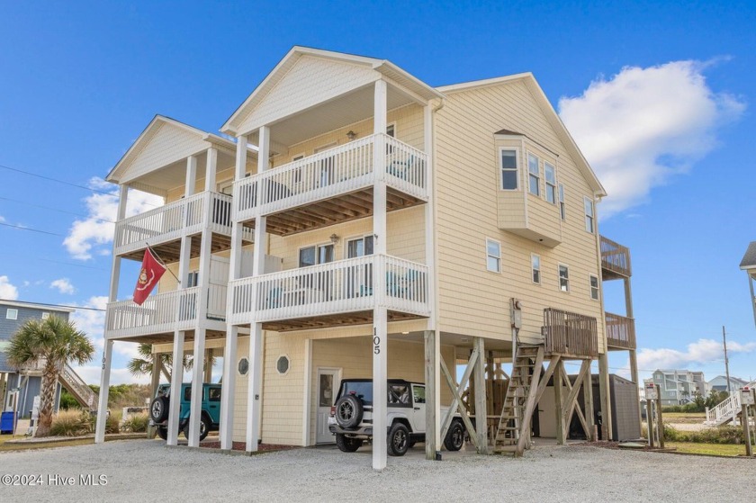 Experience coastal living at its finest in this stunning - Beach Townhome/Townhouse for sale in North Topsail Beach, North Carolina on Beachhouse.com