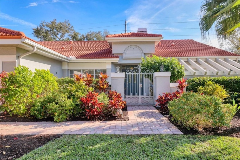 Walk through the front gate and courtyard to discover refined - Beach Home for sale in Sarasota, Florida on Beachhouse.com