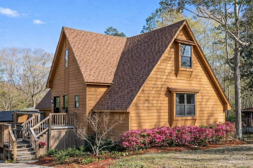 Discover a rare, one-owner lakefront retreat designed as an - Beach Home for sale in Milton, Florida on Beachhouse.com