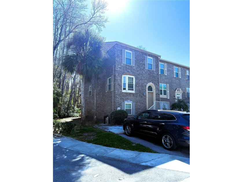 This 4-bedroom, 3 1/2-bath townhome is conveniently located on - Beach Townhome/Townhouse for sale in Palm Harbor, Florida on Beachhouse.com