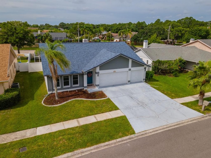 3 BR/2 BA/3-CAR GARAGE pool home with LARGE COVERED & SCREENED - Beach Home for sale in Tampa, Florida on Beachhouse.com