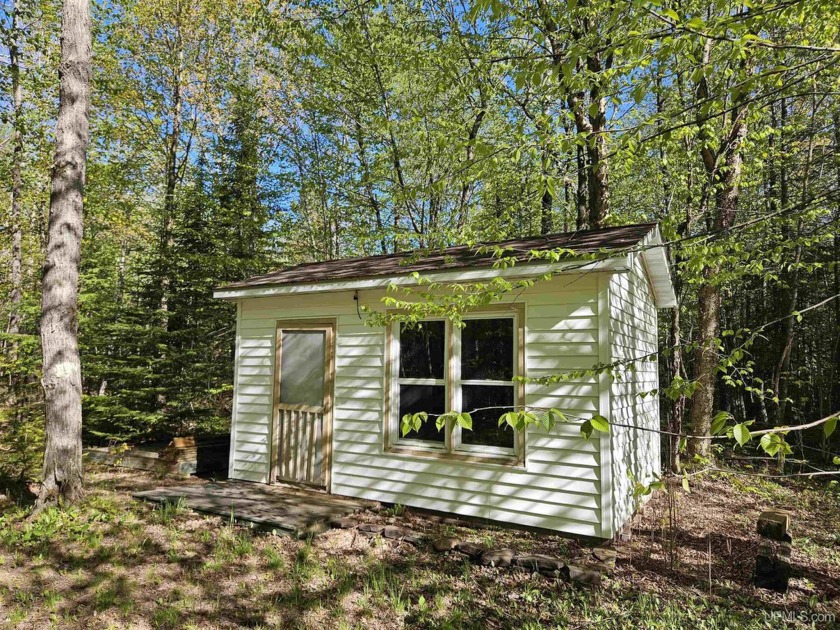 Beautiful Duck Creek Frontage with 21 acres and a cabin.  this - Beach Acreage for sale in Ontonagon, Michigan on Beachhouse.com