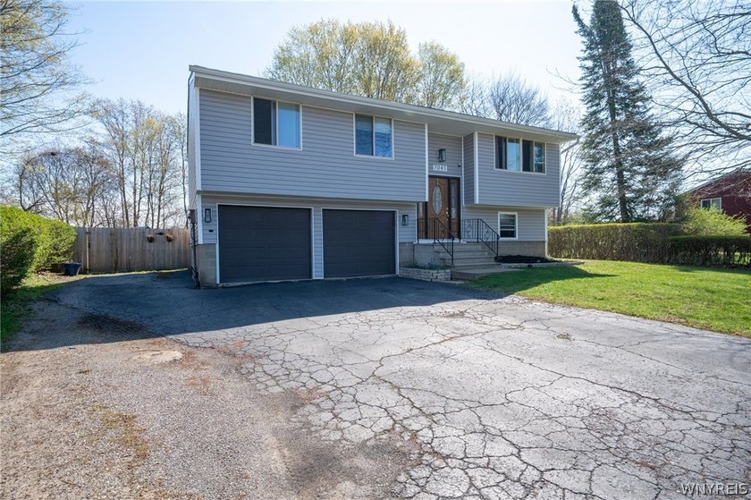 This is just a solid house. Raised ranch layout so things are a - Beach Home for sale in Derby, New York on Beachhouse.com
