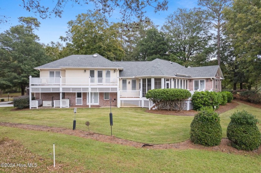 Location, location, location! This stunning, custom home sits on - Beach Home for sale in Supply, North Carolina on Beachhouse.com