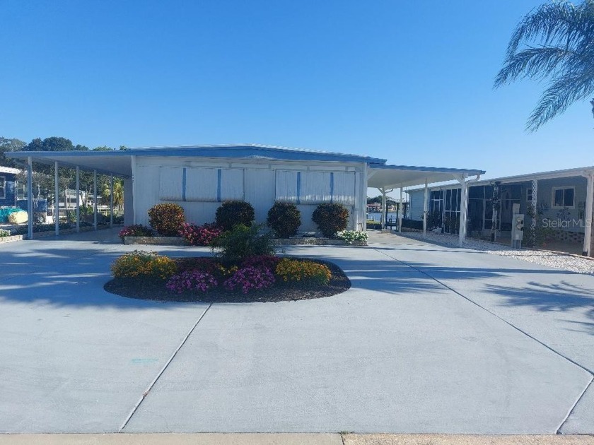 2BR-2BA LOCATED DIRECTLY ON LAKE TARPON CANAL-- BEAUTIFUL VIEW - Beach Home for sale in Palm Harbor, Florida on Beachhouse.com