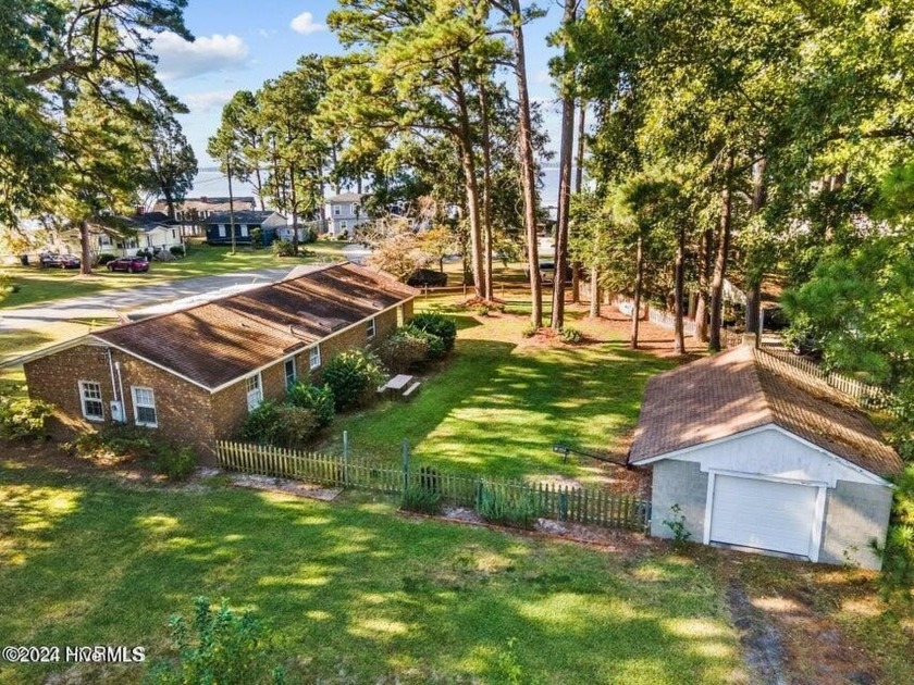 This spacious 3 bedroom 2 bath home showcases beautiful hardwood - Beach Home for sale in Bath, North Carolina on Beachhouse.com