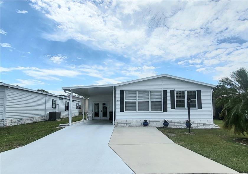 This well-maintained home is a true gem, with a stunning - Beach Home for sale in Barefoot Bay, Florida on Beachhouse.com