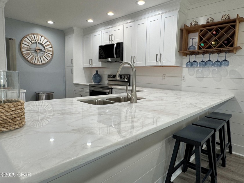 Step into refined coastal living with Pool Villa 1107 at - Beach Condo for sale in Panama City Beach, Florida on Beachhouse.com