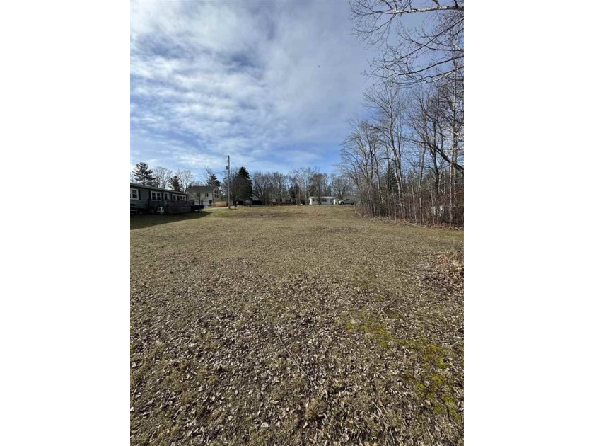 This 0.34 acre wooded lot (100'x150') offers a prime location in - Beach Lot for sale in Mackinaw City, Michigan on Beachhouse.com