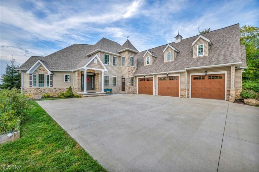 This beautiful three-story lakefront home, with direct - Beach Home for sale in Mentor, Ohio on Beachhouse.com