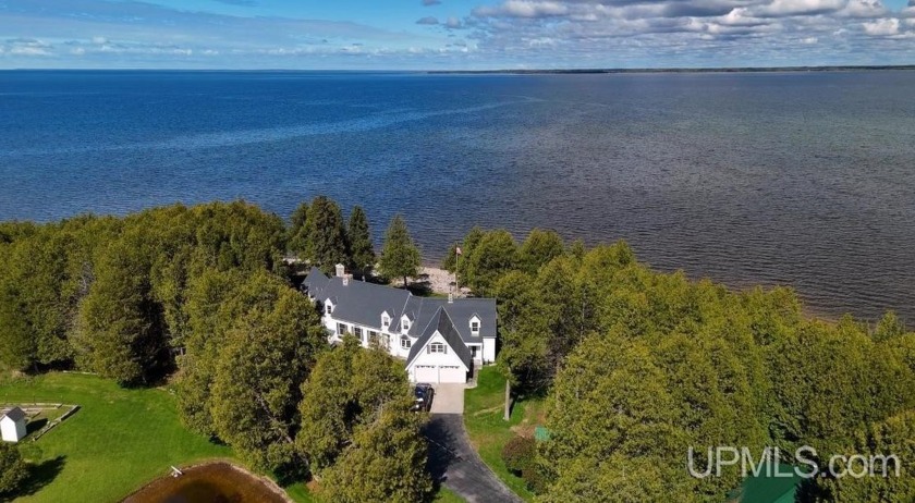 Experience breathtaking sunsets and serene seclusion on this - Beach Home for sale in Garden, Michigan on Beachhouse.com