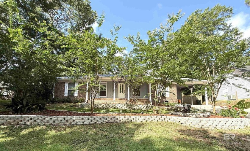 Welcome to this beautifully remodeled home, brimming with - Beach Home for sale in Daphne, Alabama on Beachhouse.com