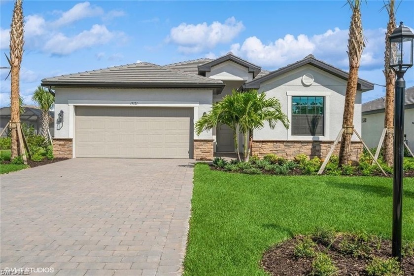 Nestled on a private lot on the lake, this 4-bedroom, 3-bathroom - Beach Home for sale in Estero, Florida on Beachhouse.com