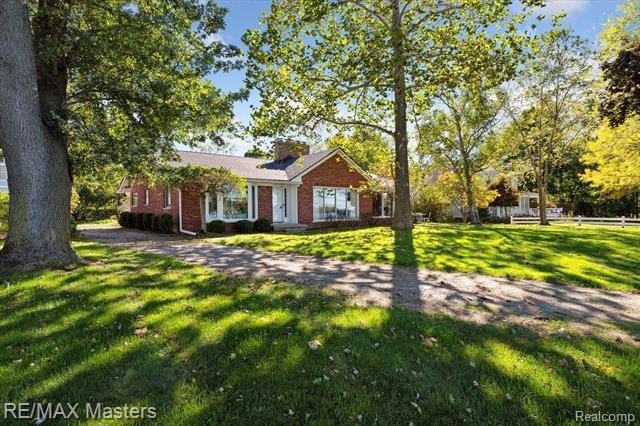 Solid Brick, 3 bedroom, 2 1/2 bath ranch on the river across - Beach Home for sale in Grosse Ile, Michigan on Beachhouse.com