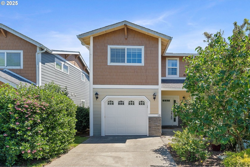 Nestled inside the gated Hilltop Estates, this spacious - Beach Townhome/Townhouse for sale in Nehalem, Oregon on Beachhouse.com