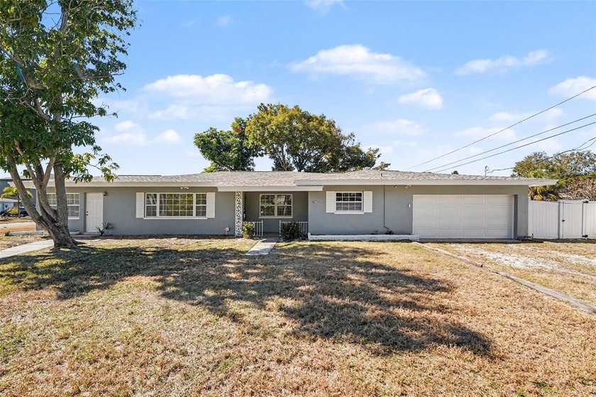 Welcome to 6795 23rd St South, where laid-back Florida living - Beach Home for sale in St. Petersburg, Florida on Beachhouse.com