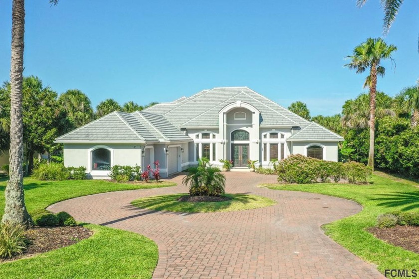 THIS CUSTOM WATERFRONT LUXURY HOME W/ 110' FRONTAGE ON FLORIDA - Beach Home for sale in Palm Coast, Florida on Beachhouse.com