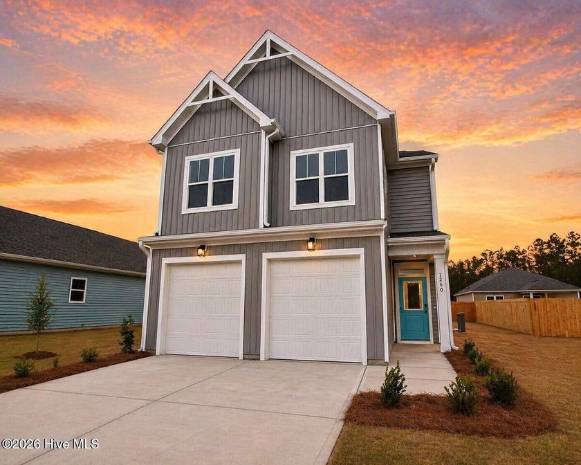 This beautifully designed two-story home offers the perfect - Beach Home for sale in Leland, North Carolina on Beachhouse.com