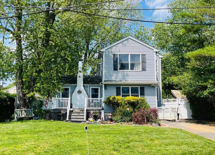 Discover this charming expanded ranch located in the highly - Beach Home for sale in East Patchogue, New York on Beachhouse.com