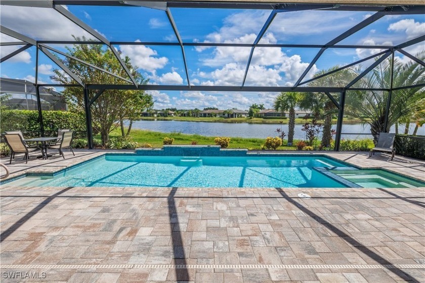 LUXURIOUS POOL/SPA HOME WITH OVERSIZED LOT AND EXPANSIVE LAKE - Beach Home for sale in Fort Myers, Florida on Beachhouse.com