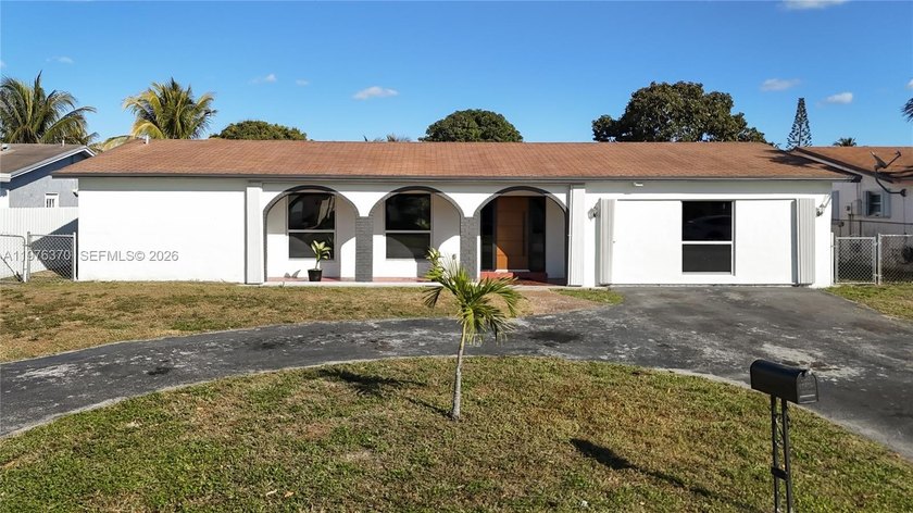 Welcome to this beautifully maintained non-HOA canal-front pool - Beach Home for sale in Miramar, Florida on Beachhouse.com