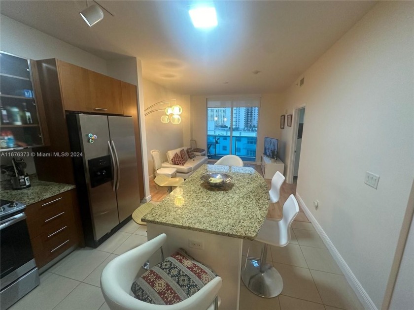 1/1 + DEN. FURNITURE INCLUDED. OPEN FLOOR PLAN, GRANITE COUNTER - Beach Condo for sale in Hallandale Beach, Florida on Beachhouse.com