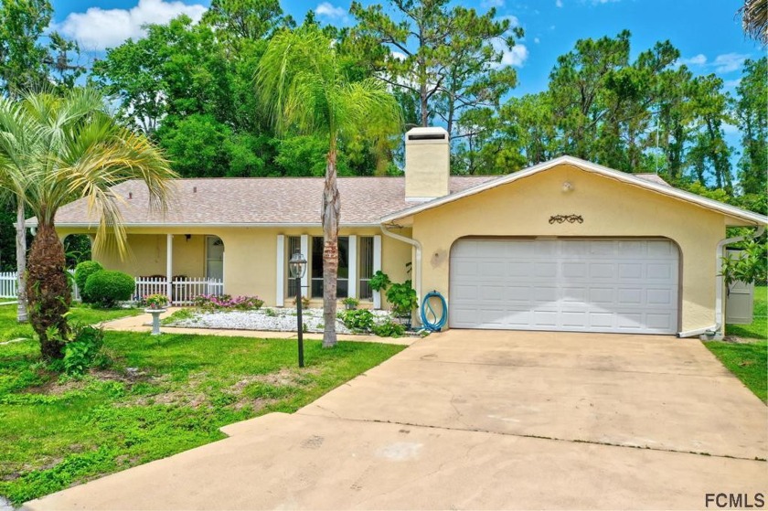 BUYER'S LOST FINANCING! BRAND NEW ROOF! Charming & impeccably - Beach Home for sale in Palm Coast, Florida on Beachhouse.com