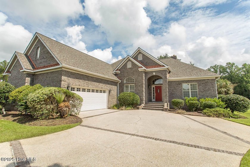 Proudly presenting this low-maintenance brick home located on - Beach Home for sale in Ocean Isle Beach, North Carolina on Beachhouse.com
