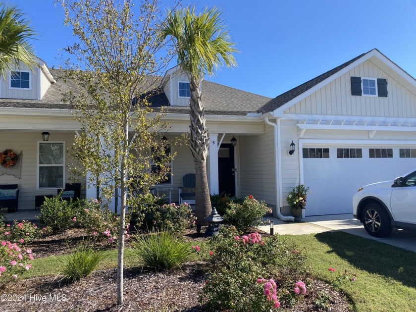 Welcome to this move-in ready, luxury Bill Clark Homes Sea Grass - Beach Condo for sale in Ocean Isle Beach, North Carolina on Beachhouse.com