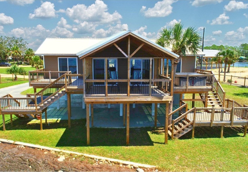 This stunning Gulf Front home, meticulously renovated and now - Beach Home for sale in Perry, Florida on Beachhouse.com