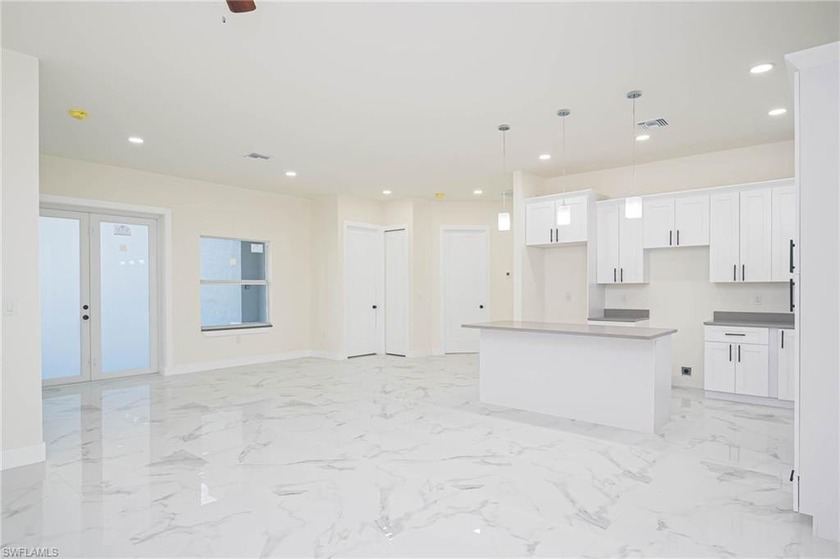 Welcome to this beautifully crafted new construction home - Beach Home for sale in Lehigh Acres, Florida on Beachhouse.com