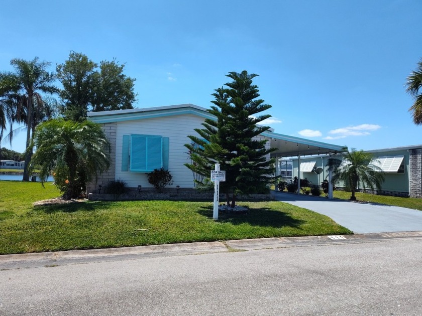 MAJOR UPDATES! Gorgeous LAKESIDE 2 bed 2 bath 1500+ sq. ft - Beach Home for sale in Vero Beach, Florida on Beachhouse.com