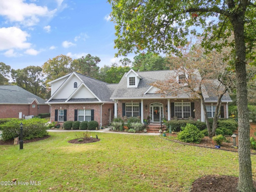 This beautiful home is nestled on a completely landscaped wooded - Beach Home for sale in Supply, North Carolina on Beachhouse.com