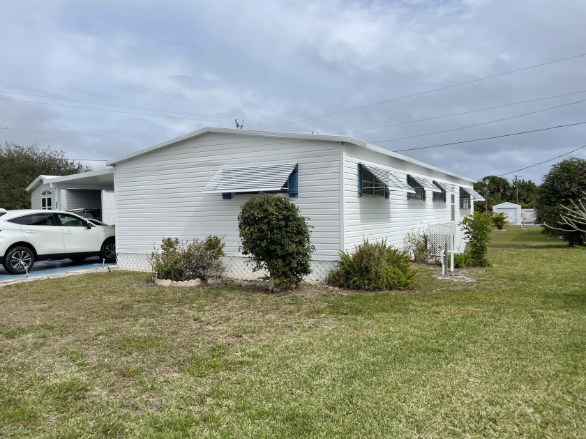 This is a 3 bedroom, 2 bath home in a well-maintained 55+ Co-op - Beach Home for sale in Hobe Sound, Florida on Beachhouse.com