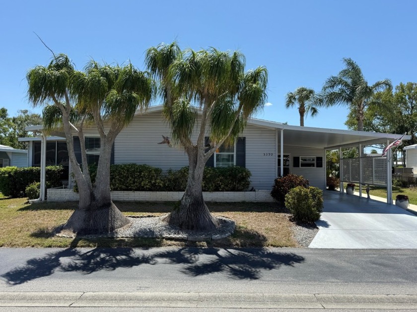 THIS HOME IS ON LEASED LAND WITH AN APPROXIMATE MONTHLY LOT - Beach Home for sale in Sarasota, Florida on Beachhouse.com