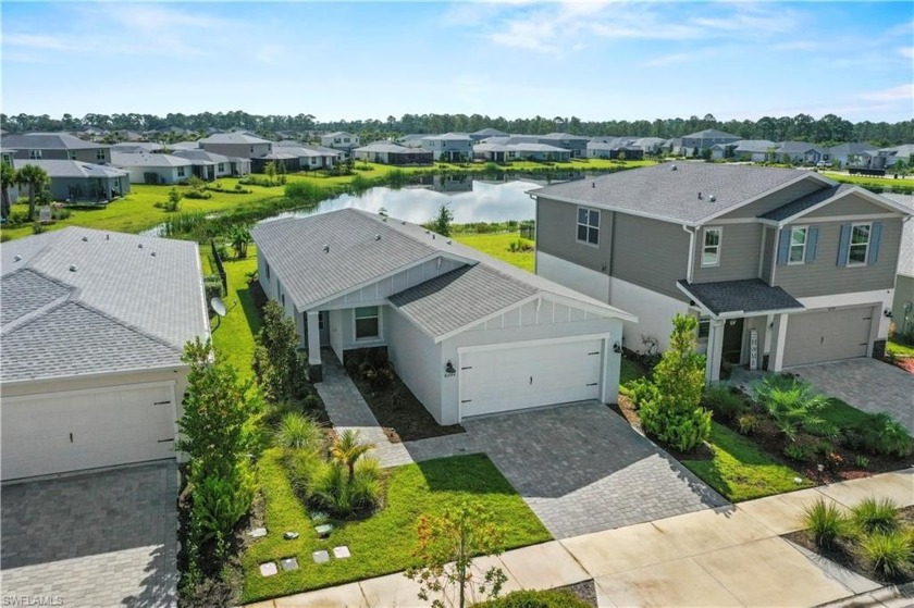 Entertain guests with ease in the open kitchen, dining, and - Beach Home for sale in Punta Gorda, Florida on Beachhouse.com