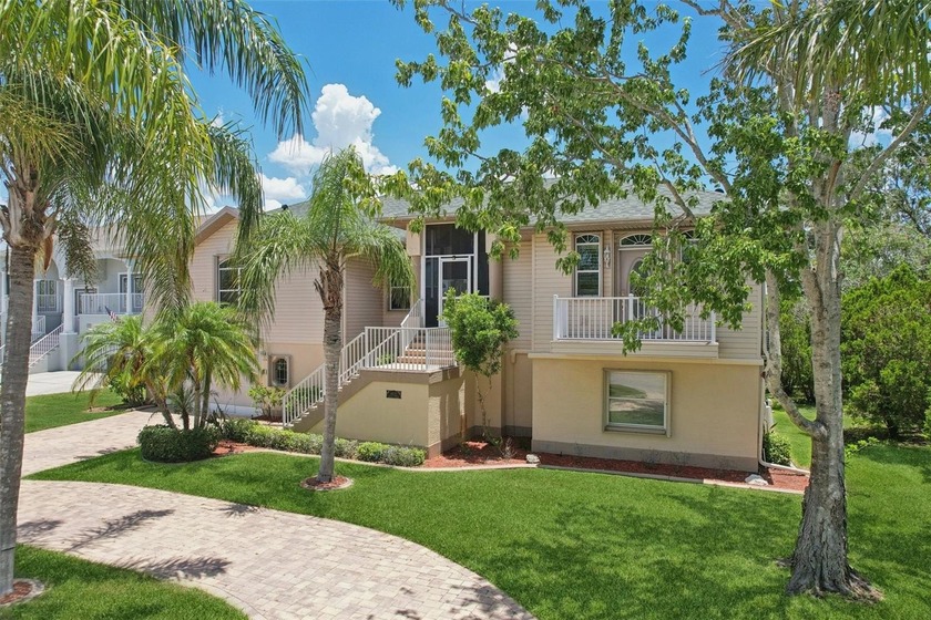 Elegant Coastal Sanctuary with Expansive Living Space. Welcome - Beach Home for sale in New Port Richey, Florida on Beachhouse.com