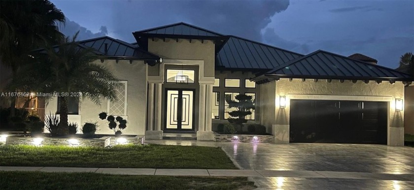 Beautiful single-story lakefront home in the quiet gated - Beach Home for sale in Miramar, Florida on Beachhouse.com