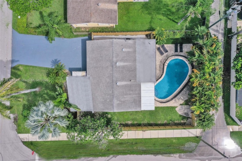 Welcome to this beautifully updated 3-bed, 2-bath home with a - Beach Home for sale in Hollywood, Florida on Beachhouse.com