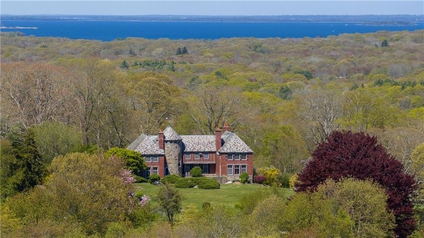 Welcome to an enchanted haven, a Tudor-inspired treasure nestled - Beach Home for sale in North Kingstown, Rhode Island on Beachhouse.com